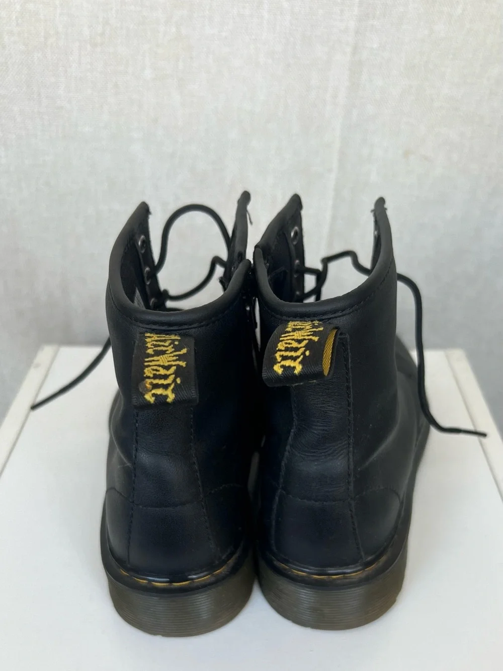Dr. Martens Black Leather 8-Eye Lace-Up Boots with Yellow Stitching